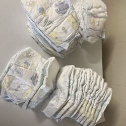 HUGGIES Diapers For New Born Size 0 and Size 1 Count 60. All 7$