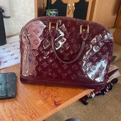 Louis Vuitton Alma Hand Bag 