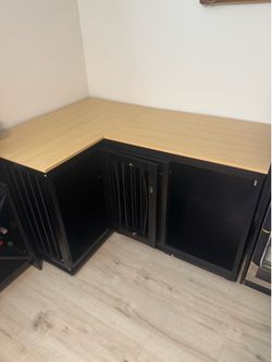 modular L-shaped dog crate furniture with a wooden countertop