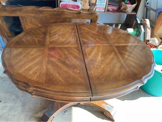 Dining  table  with  2  leaves  &  4  chairs  -  $150