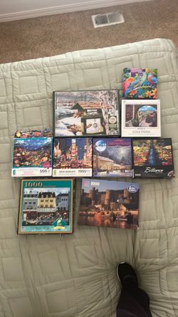 Lot of 9 Puzzles $15 or $3 each