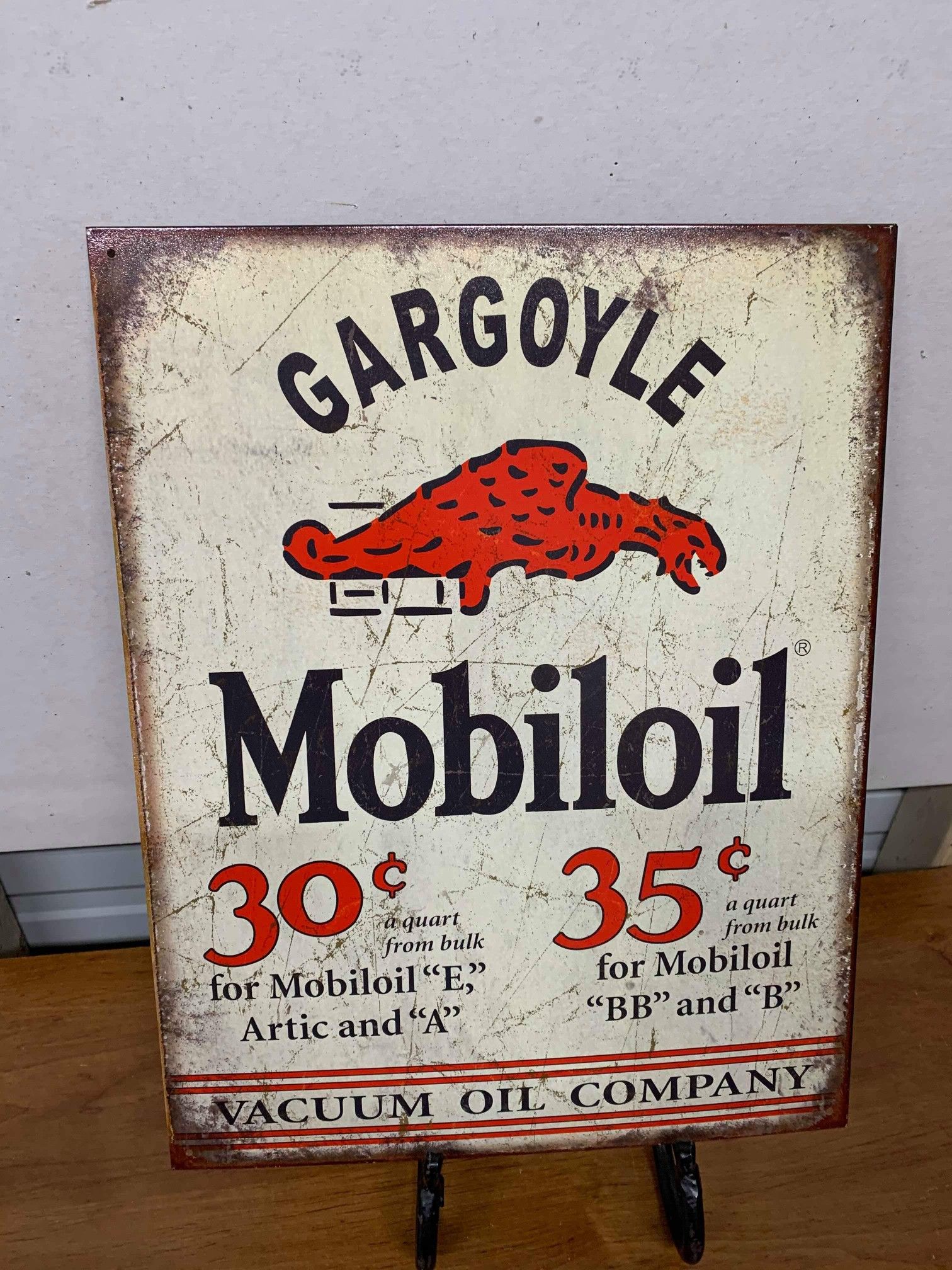 Gargoyle tin sign