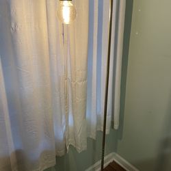 Standing industrial gold lamp