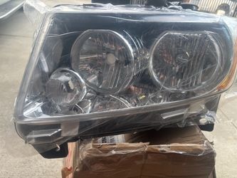 Automotive Headlight Assembly New in Wrap