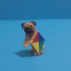 Danbury Mint Pug Miniature Dog Figure Collection, w/ kite by its Side. 