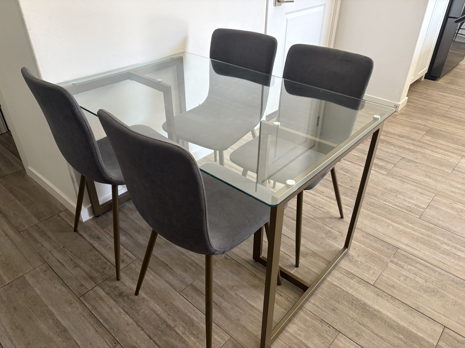 Glass kitchen table And chairs 