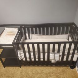 Black Wooden Crib With Attached Changing Table