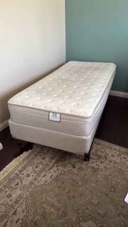Twin XL mattress with box spring and rolling frame