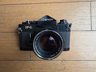 Canon F-1 35mm film camera and Canon FD 50mm 1.4 silver rim lens