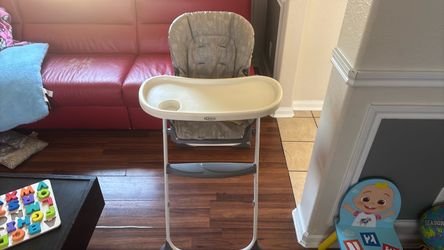 High Chair for sale.
