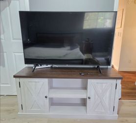 Samsung TV and TV stand