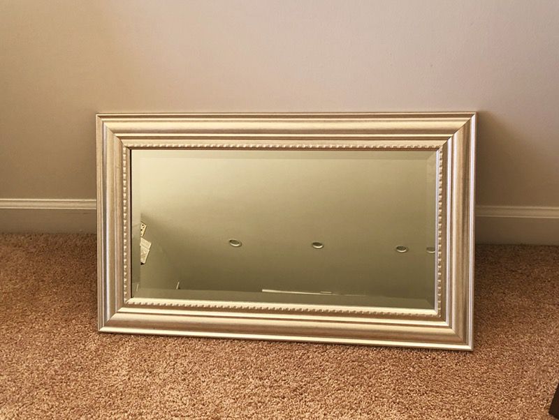 Small decorative wall mirror