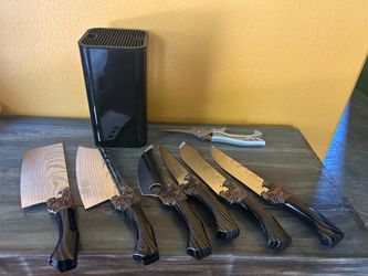 New 8 Piece Kitchen Knife Set. Decorative. Statement pieces