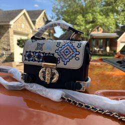 Handmade embroidered mini bag