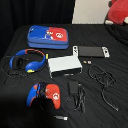 Nintendo Switch OLED, Case, Controller, Headset, And 2 Games
