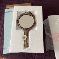 Brand-new vintage mermaid brass hand mirror