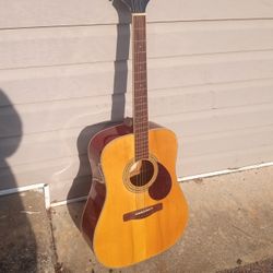 Acoustic Guitar In Fair Condition 