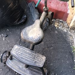 An antique might be worth some money 20 bucks cleaning out my closetand  garage