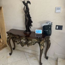 Table With Statue