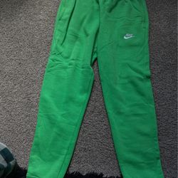 Green Nike sweats