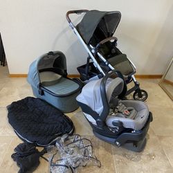 Uppababy Cruz V2 stroller with Bassinet and car seat and cozy ganoosh 