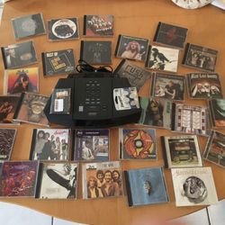 Bose Wave Radio / CD player / Alarm Clock NEW REMOTE & Batteries PLUS (30) Rock CDs  Some of the greatest from the 70s TESTED 100% WORKING Excellent C