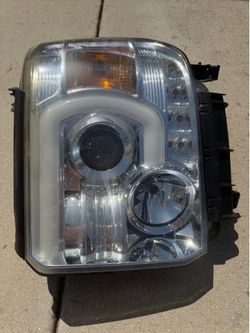 2014 GMC Sierra OEM Headlights