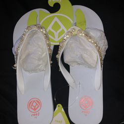 Woman’s Name Brand Reef Sandals 