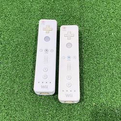 2 Nintendo Wii Remotes