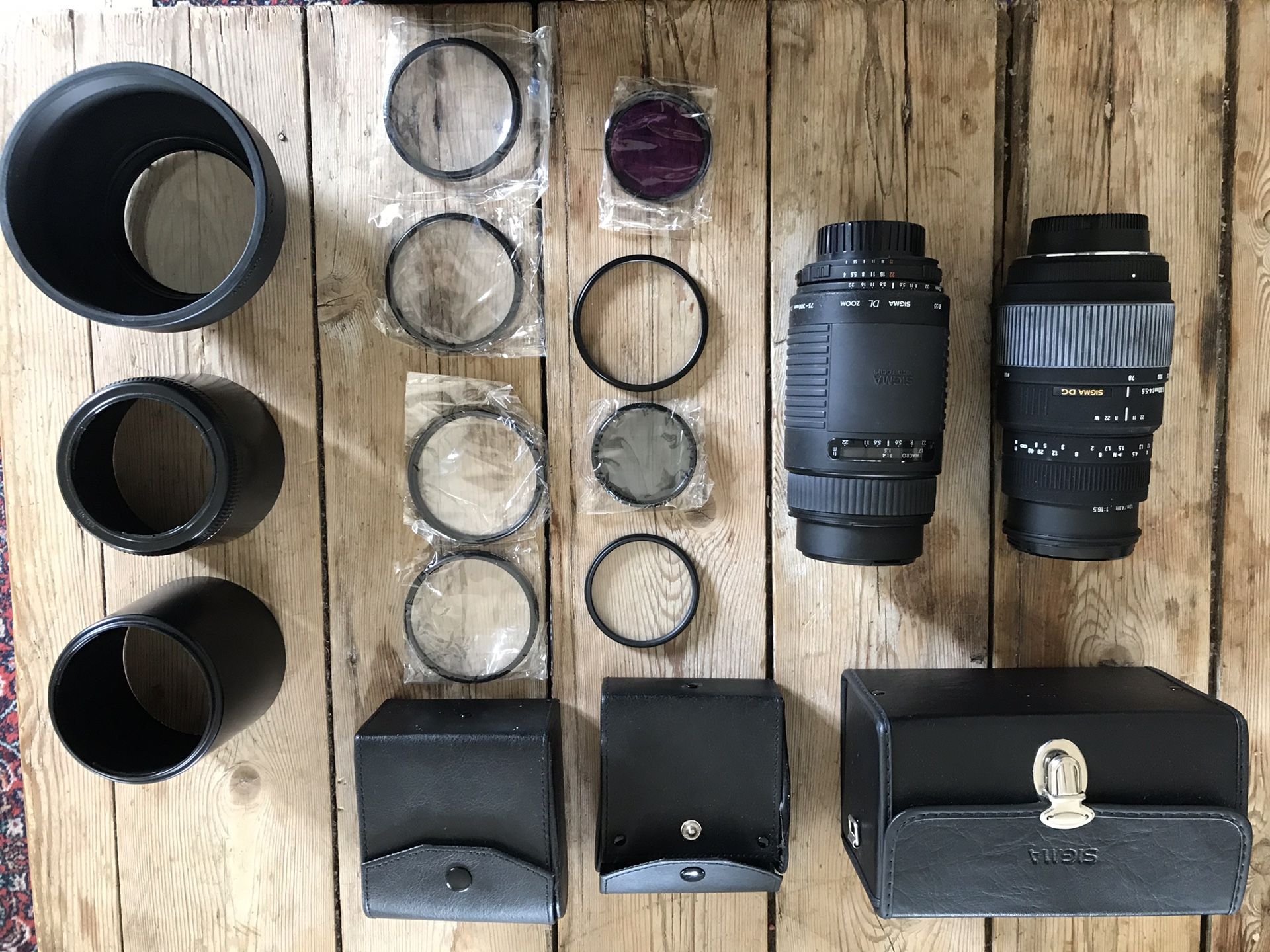 Nikon mount Sigma zoom lenses with UV filters and Lens Hoods