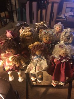9 wood dolls