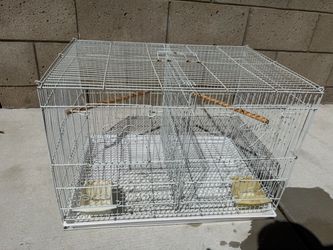 Bird cage with divider