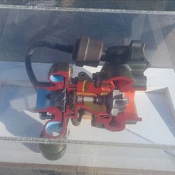 Turborcharger Cutaway In A Plastic Display Case 