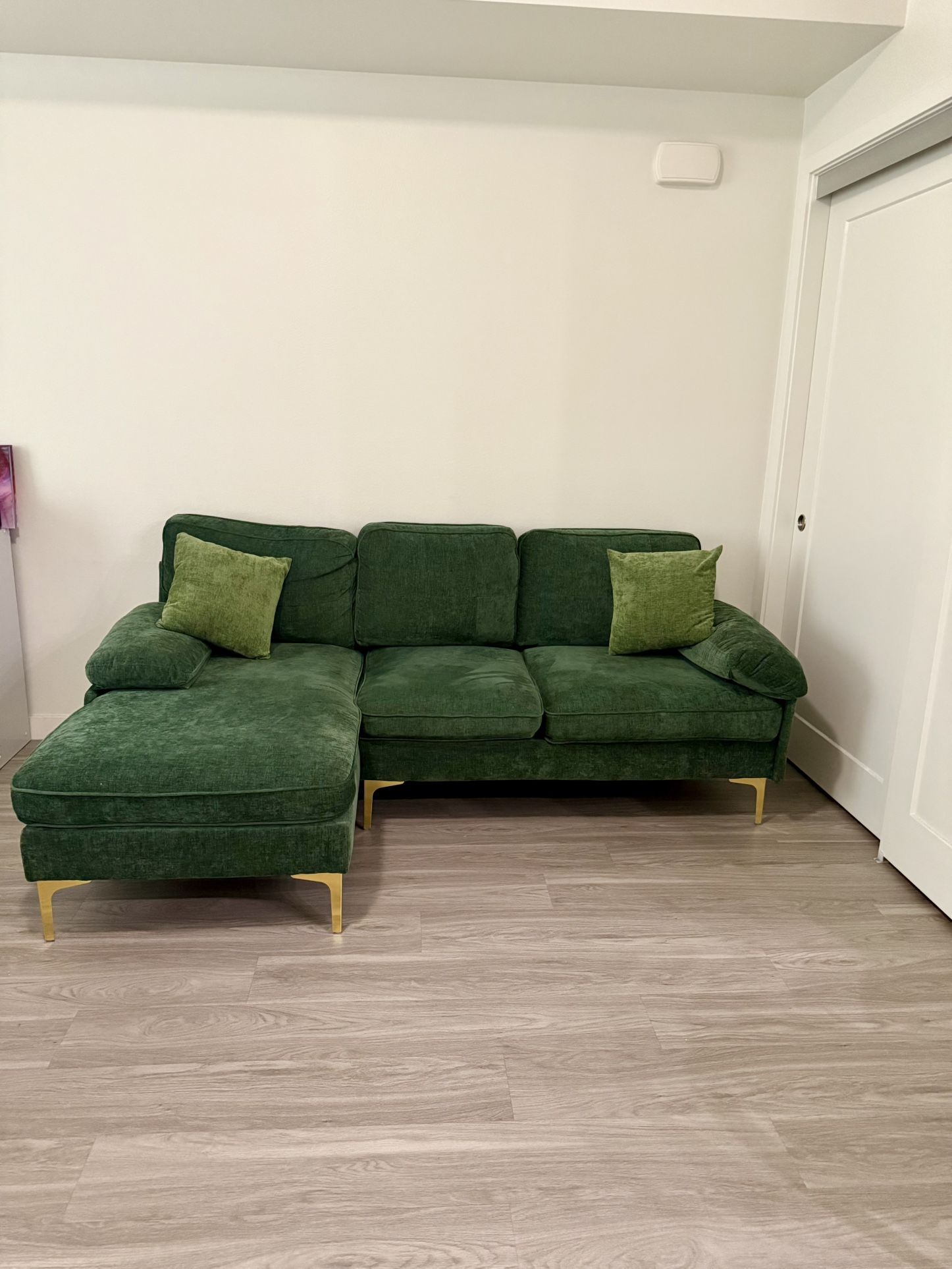 Beautiful L-shaped Green Couch With Pillows