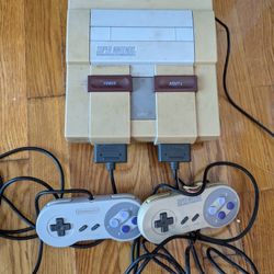 SNES super Nintendo With Two Controllers