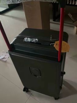 Suitcase with cup holder built in
