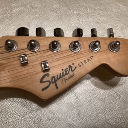 Fender Squier Electric Guitar With White Pickguard. 