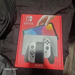 Nintendo Switch Oled Model With White Joy-con