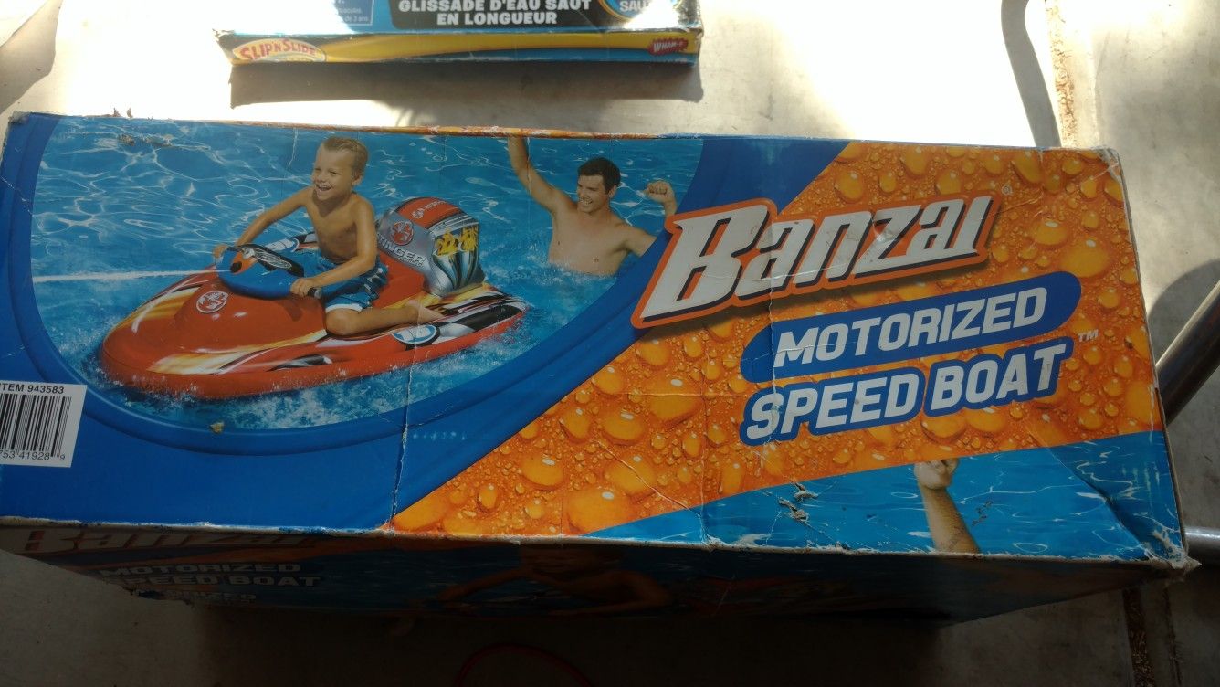 Motorized speed boat. An 2 different slip and slides