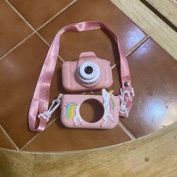 digital camera with a pink unicorn silicone case