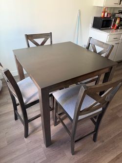 Wooden 4 chair dining table