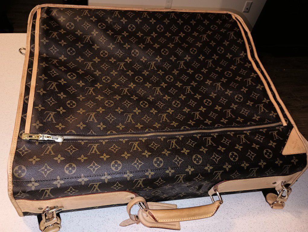 LV Garment Travel BagI Also Have 3 Hangers for Sale in Oxnard