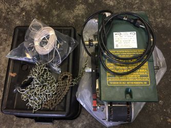 Industrial garage door opener with remotes. Like new