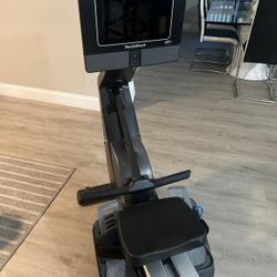Professional rowing machine with HD rotating screen
