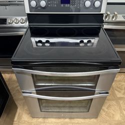 WHIRLPOOL DOUBLE OVEN GLASS TOP STOVE.