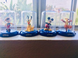 Disney collectible figures Pinocchio, Pluto ,Mickey Mouse and Tigger
