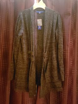 Ladies size medium open front cardigan. Is darker than photo appears.