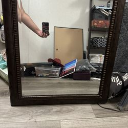 27x34 Mirror With A Wooden Frame