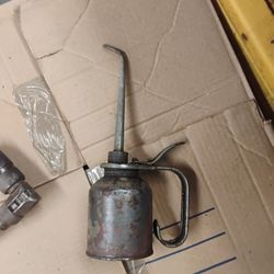 Antique Oil Can, Ice Skates And Silver Pitcher 