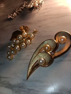 2 Females " Trifari" Broaches